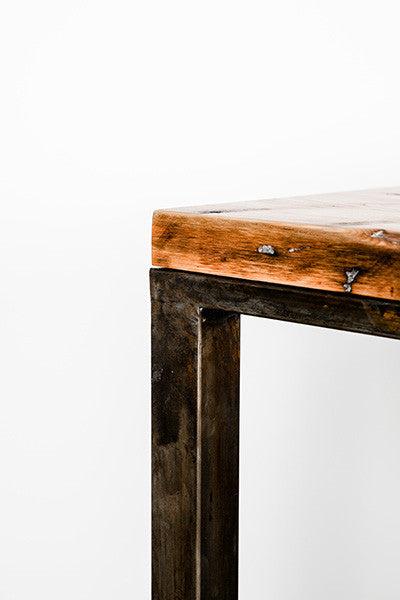 reclaimed wood dining table with metal base